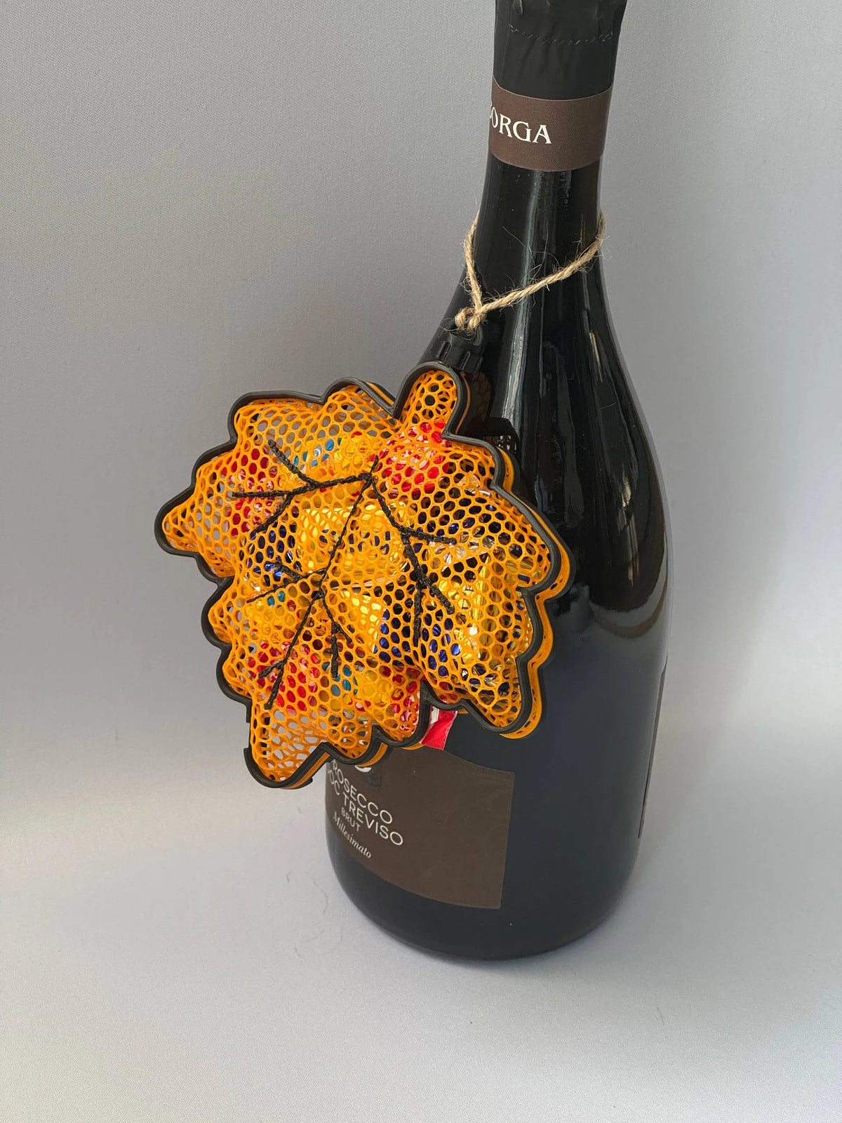Feuille d'érable en filet – décor de bouteille à garnir